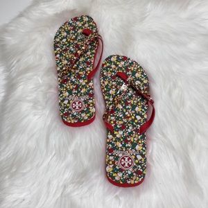 Tory Burch floral flip flops